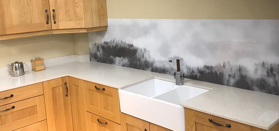 JHC Hardware, Northern Ireland displaying Vista Hazy Forest acrylic splashback 